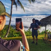 Mates taking pictures on the Kokoda Trail Deniki